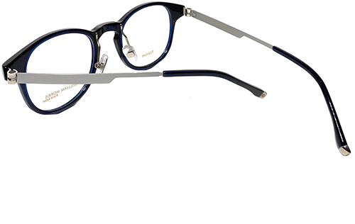 William Morris London's round structure, encompasses rich Italian acetates.  A style which exudes pure confidence. Sunglasses Side Left FocusWorksEyewear